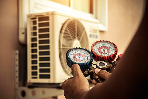 Professional Air Conditioning Service technician working in Fairview, NC